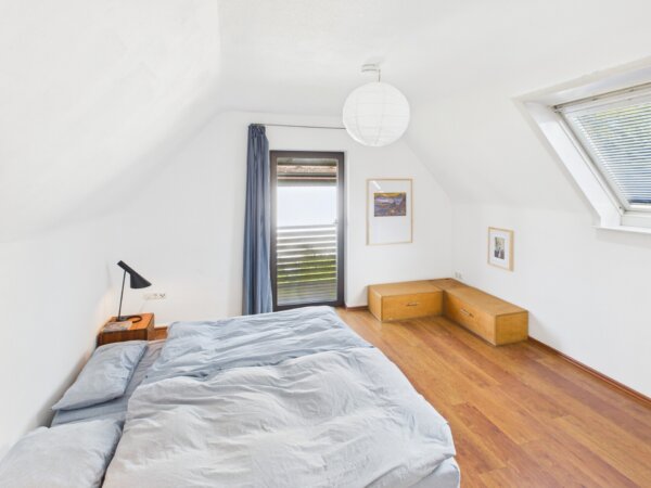 Schlafzimmer mit Balkonzugang
